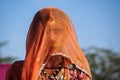 Jaisalmer, India - Jan 01, 2020: Rajasthani gypsy woman in traditional attire