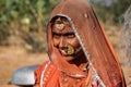 Jaisalmer, India - Jan 01, 2020: Rajasthani gypsy woman in traditional attire