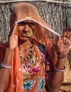 Jaisalmer, India - Jan 01, 2020: Rajasthani gypsy woman in traditional attire