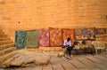 A street vendor selling textile carpets Royalty Free Stock Photo