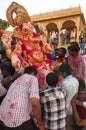 JAISALMER, INDIA - SEPTEMBER 8th: Devotees carying the statue of Lord Ganesha during Ganesha Chaturthi festival Royalty Free Stock Photo