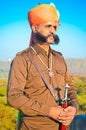 Portrait of Indian village man with huge mustache wearing turban and traditional