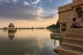 Jaisalmer, Rajasthan, India - 13.10.2019 : Chhatris and shrines of hindu Gods and goddesses at Gadisar lake, Indo-Islamic