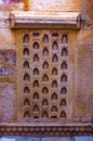 Small arch gap in sandstone wall for oil lamps in Jaisalmer Fort Palace, Rajasthan