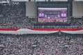 Jakarta, Indonesia - April 13, 2019: Candidate of president of Joko Widodo/ Jokowi on big screen in front of his fans and Royalty Free Stock Photo