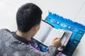 Young male muslim reading Koran Royalty Free Stock Photo