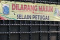 jakarta, indonesia - august 13, 2023 : no entry sign "dilarang masuk selain petugas" at a tourist spot