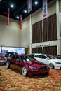 Stanced red BMW 530i E60 sedan in IAM automodified jakarta 2023 Royalty Free Stock Photo