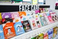 Jakarta, Indonesia, february 16, 2022: Face care and cosmetics products displayed on shelves in department store. Skin care and