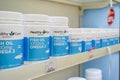 Jakarta, Indonesia, february 16, 2022: Various types of vitamins and supplements, fish oil on the pharmacy shelf. Drugstore and