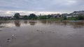 Jakarta, Jakarta / Indonesia - January 1th 2020: rubbish carried by flood water flow Royalty Free Stock Photo