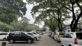 Rows of visitors\' cars in the parking area of Ragunan Zoo