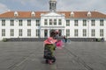 Tourists in Fatahillah Square, Jakarta History Museum on the back Royalty Free Stock Photo