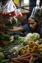 Jakarta, Indonesia - June 20, 2020: A man selling the vegetables