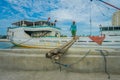 JAKARTA, INDONESIA - 5 MARCH, 2017: Daily activities inside famous old port area of Jakarta, fishing boat lying at