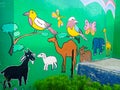 Jakarta, Indonesia - March, 2022: A garden wall full of pictures of various kinds of animals in a garden in Jakarta, Indonesia