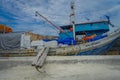 JAKARTA, INDONESIA - 5 MARCH, 2017: Inside famous old port area of Jakarta, fishing boats lying at harbor, fishermen