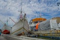 JAKARTA, INDONESIA - 5 MARCH, 2017: Inside famous old port area of Jakarta, fishing boats lying at harbor, fishermen