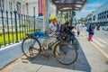 JAKARTA, INDONESIA - 3 MARCH, 2017: Locals waiting for public transportation at bus stop outside bank museum