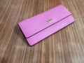 Jakarta, Indonesia, March 04, 2023. Pink wallet for women.Kate Spade Cameron Street Alli. Color Light Pink. Dompet Wanita