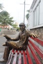 Jakarta-Indonesia, 13-MARCH-2021. A statue of a grandfather holding a book.