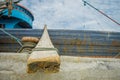 JAKARTA, INDONESIA - MAY 06, 2017: Close up view of a huge trunk in port area of Jakarta, fishing boats lying at harbor