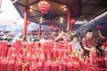 Crowded people with incense sticks in the temple