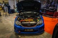 Blue Subaru WRX STI showing the EJ25 engine Royalty Free Stock Photo