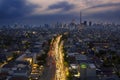 traffic jam in Kampung Melayu with Jakarta skyline