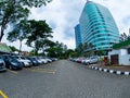 Yellow central line of parking lot area with cars view