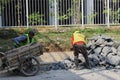 construction workers repairing water pipes