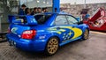 Blue Subaru Impreza WRX STI Blobeye in gas station Royalty Free Stock Photo