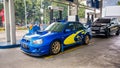 Blue Subaru Impreza WRX STI Blobeye in gas station Royalty Free Stock Photo