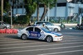 Jakarta, Indonesia - October 4 2023: White and Blue Police Car Stopped Roadside Royalty Free Stock Photo