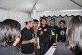 JAKARTA, INDONESIA ; Reporters are interviewing Indonesian rock band pewe gaskin.