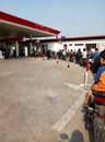 Long queues to refuel motorbikes during rush hour at Pertamina gas stations