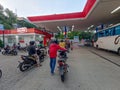Jakarta Indonesia September 29 2023: Antrian Sepeda motor at SPBU or Queue of motorbike at gas station