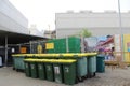 neatly arranged piles of rubbish bins