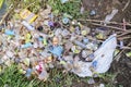 Plastic waste heaps on the riverside