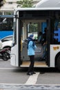 Jakarta, Indonesia - September 10, 2020: A woman is giving a thank you sign for its customer that has been taken the TransJakarta Royalty Free Stock Photo