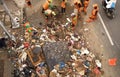 Jakarta, jakarta / indonesia - january 4th 2020: The janitor cleaning and transporting the rubbish left over by the flood disaste