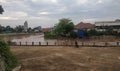 Jakarta, Jakarta / Indonesia - January 1th 2020: rubbish carried by flood water flow Royalty Free Stock Photo