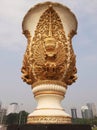 Jakarta, July 30-2023 :Giant flower vase with relief carving of a jatayu bird painted in gold color at Merdeka Park, Jakarta