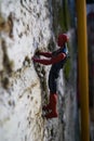 Jakarta March 2021, Kids toy Spiderman climbing on the wall