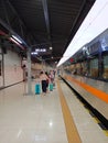 Jakarta Pasar Senen station train platform. People going to depart the train. Royalty Free Stock Photo