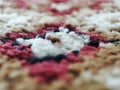 Jakarta 15 September 2023-Background-macro photo- red, white, brown and a little black carpet texture Royalty Free Stock Photo