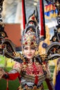 Jakarta - September 5, 2018: portrait of beautiful woman in south east asia traditional cerimonial costume red , gray and black Royalty Free Stock Photo