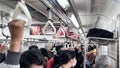 Jakarta train interior seating area, departure station, bright train interior, Passenger seatless train. Bekasi, Indonesia, May 1 Royalty Free Stock Photo