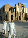 Jalalabad, Afghanistan: Two men stand in front of the Seraj-ul Emorat ruins