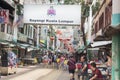 Jalan Petaling Chinatown, Kuala Lumpur, Malaysia: 31 March 2019: Tourists shopping in the famous Petaling Street in Kuala Lumpur